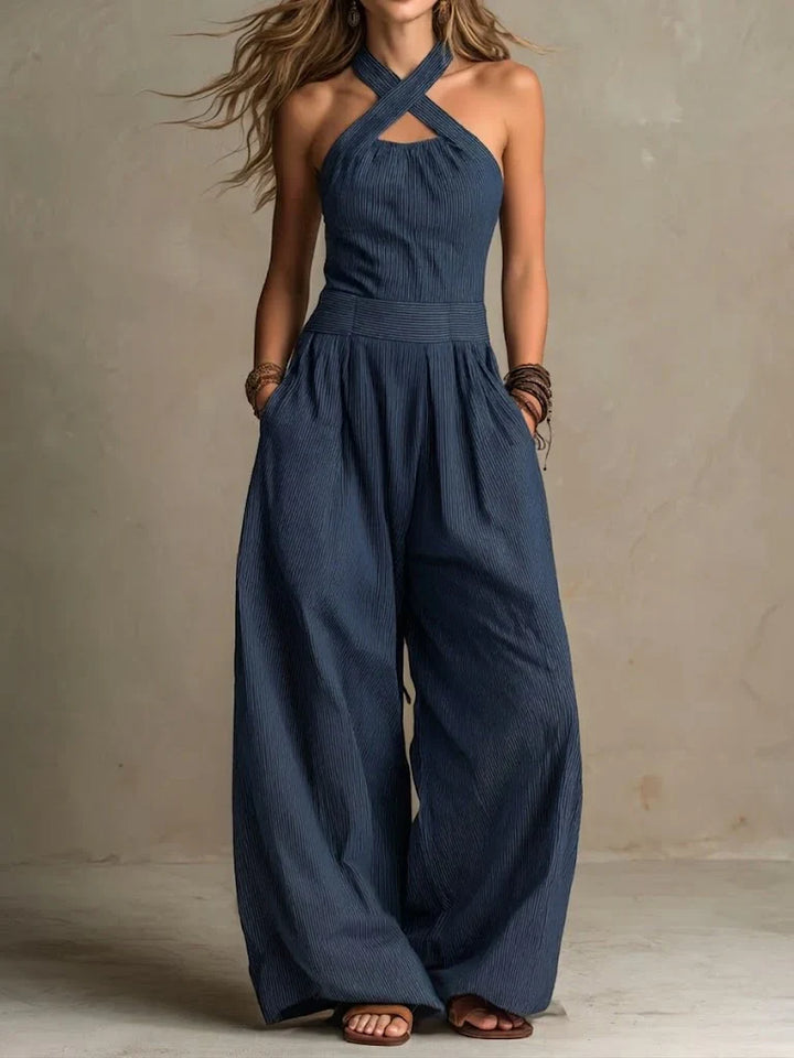 Bianca - Tuta jumpsuit grigia con scollo incrociato dal taglio sofisticato